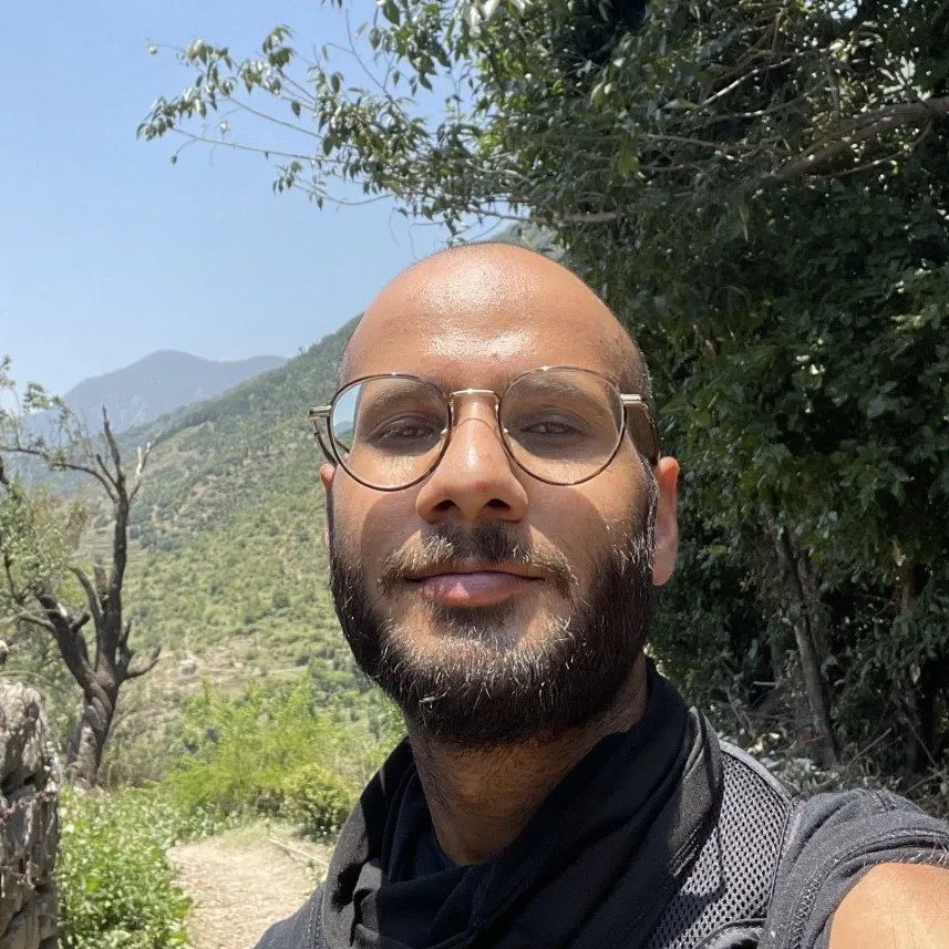 Image of Arjav, an Indian man wearing a black shirt