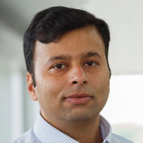 Sunandan wearing a white shirt